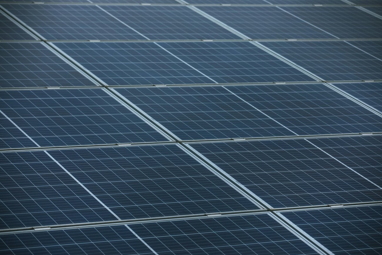 Technician working on solar panels